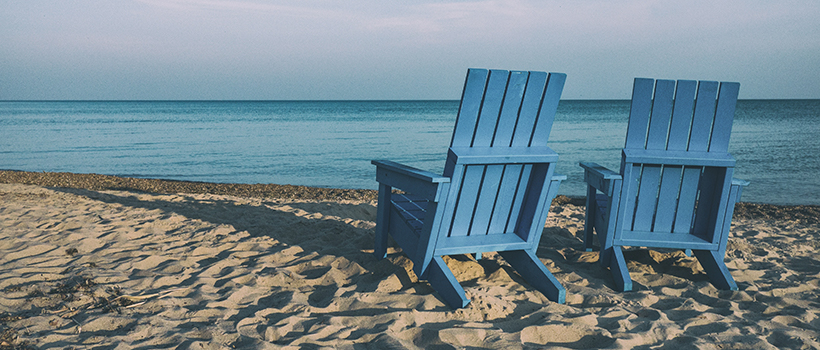 Two Blue Chairs on a beach